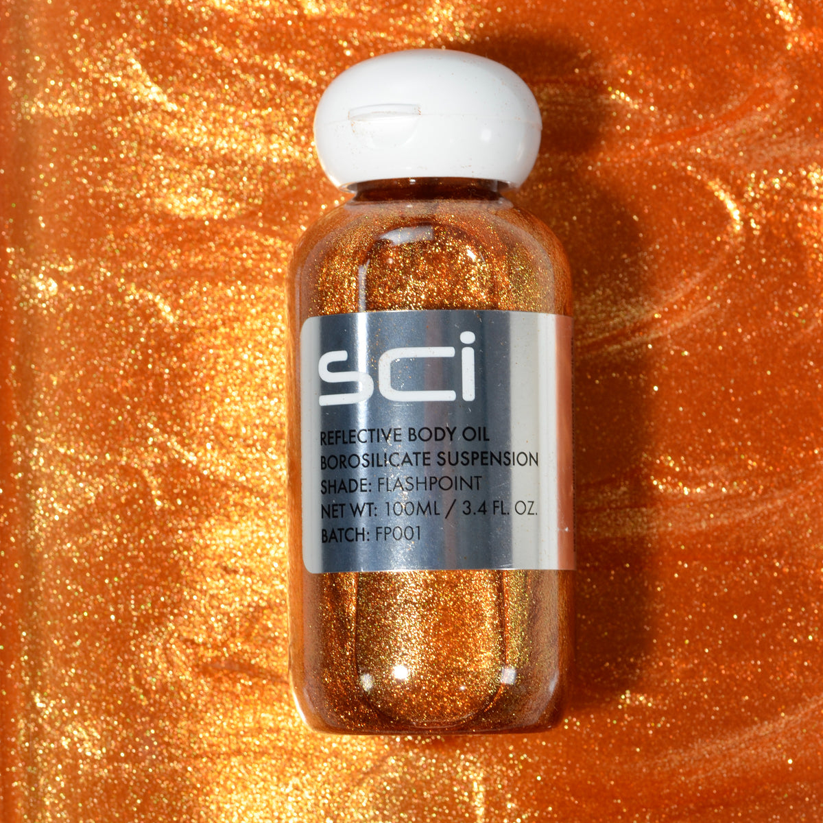 Reflective Shimmer Body Oil Photo with texture background