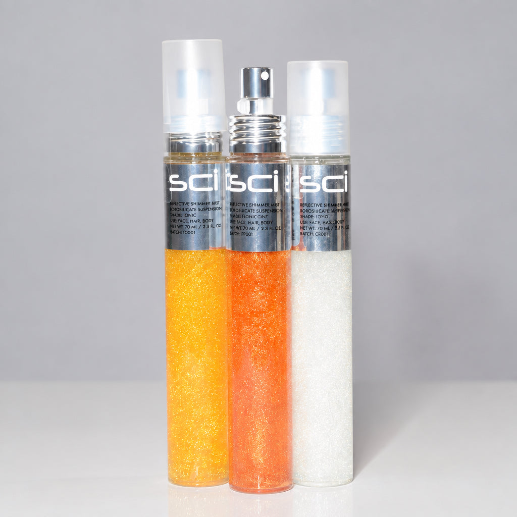 Three Sci Sci spray bottles filled with glittery shampoo, conditioner, and moisturizer, shown against a light gray background.